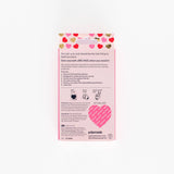 Back of a Big Hug Period Support Vitamin Patches package with a pink heart pattern at the top. Text highlights PMS relief, key features, directions, ingredients, and shows the patch’s actual size in a heart shape.