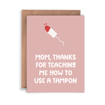 Thanks for Teaching Me To Use a Tampon Card: A pink greeting card with tampon illustration and the message, "Mom, thanks for teaching me how to use a tampon." A unique Mother's Day card. Envelope included.