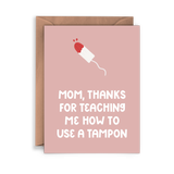 Thanks for Teaching Me To Use a Tampon Card: A pink greeting card with tampon illustration and the message, "Mom, thanks for teaching me how to use a tampon." A unique Mother's Day card. Envelope included.