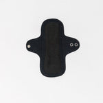 Hello Liners 2 Pack- Fresher Than A Daisy: Reusable black cloth panty liners with wings and metal snaps, ultra thin and machine washable for easy care, displayed flat on a white background.