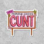 The Now Proudly Serving CUNT Vinyl Sticker features bold, bright lettering with floral details on a light concrete background.
