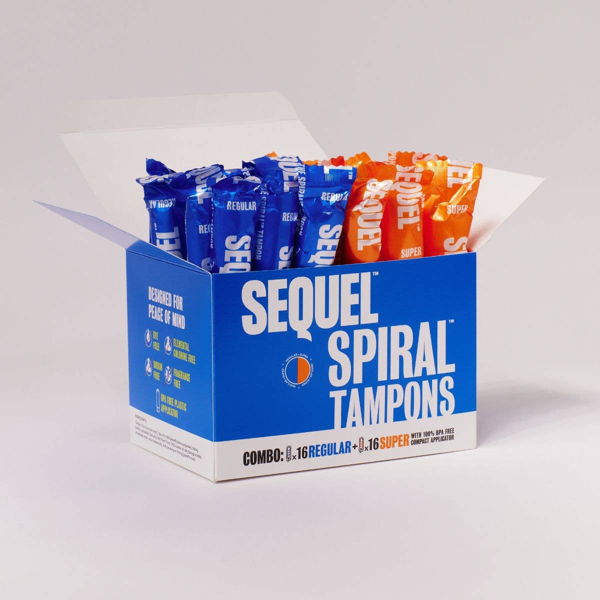 An open box of Sequel™ The Spiral™ Tampons displays blue-wrapped regular and orange-wrapped super tampons. The packaging features helical grooves for reliable protection and distraction-free periods.