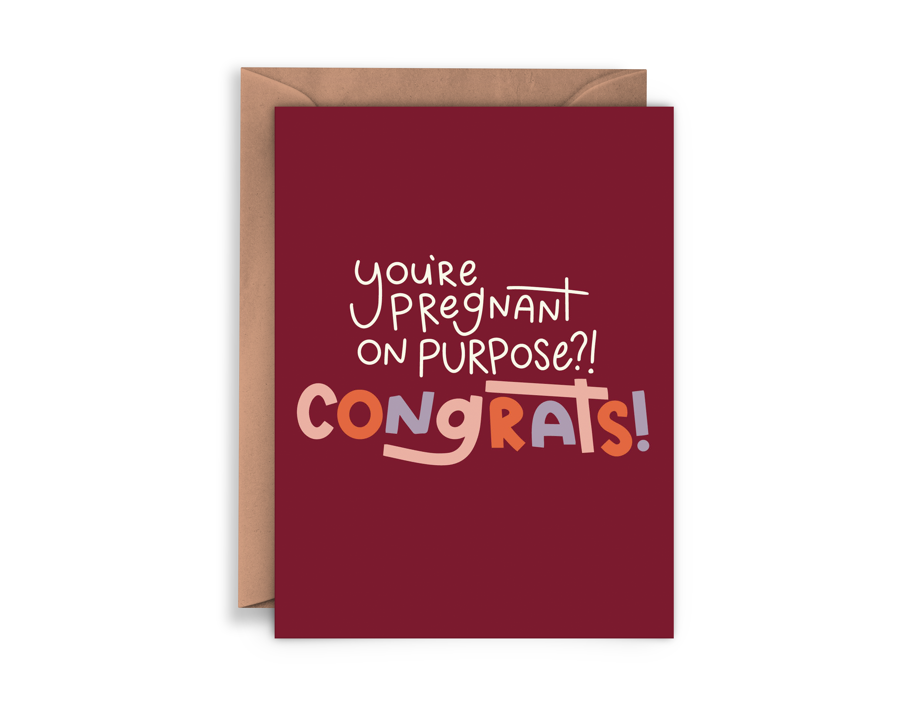 The "You're Pregnant on Purpose Card" features a burgundy cover with playful, colorful text reading, "You're pregnant on purpose?! CONGRATS!" and comes with a brown envelope partially visible behind the card.