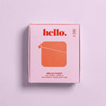 A pink Hello Caddy box with red text reading "hello." and "HELLO CADDY HELLO DISC CARRY & MICROWAVE STERILISER CASE" sits on a light purple background. This case doubles as a period product cleaner and features a simple red graphic design.