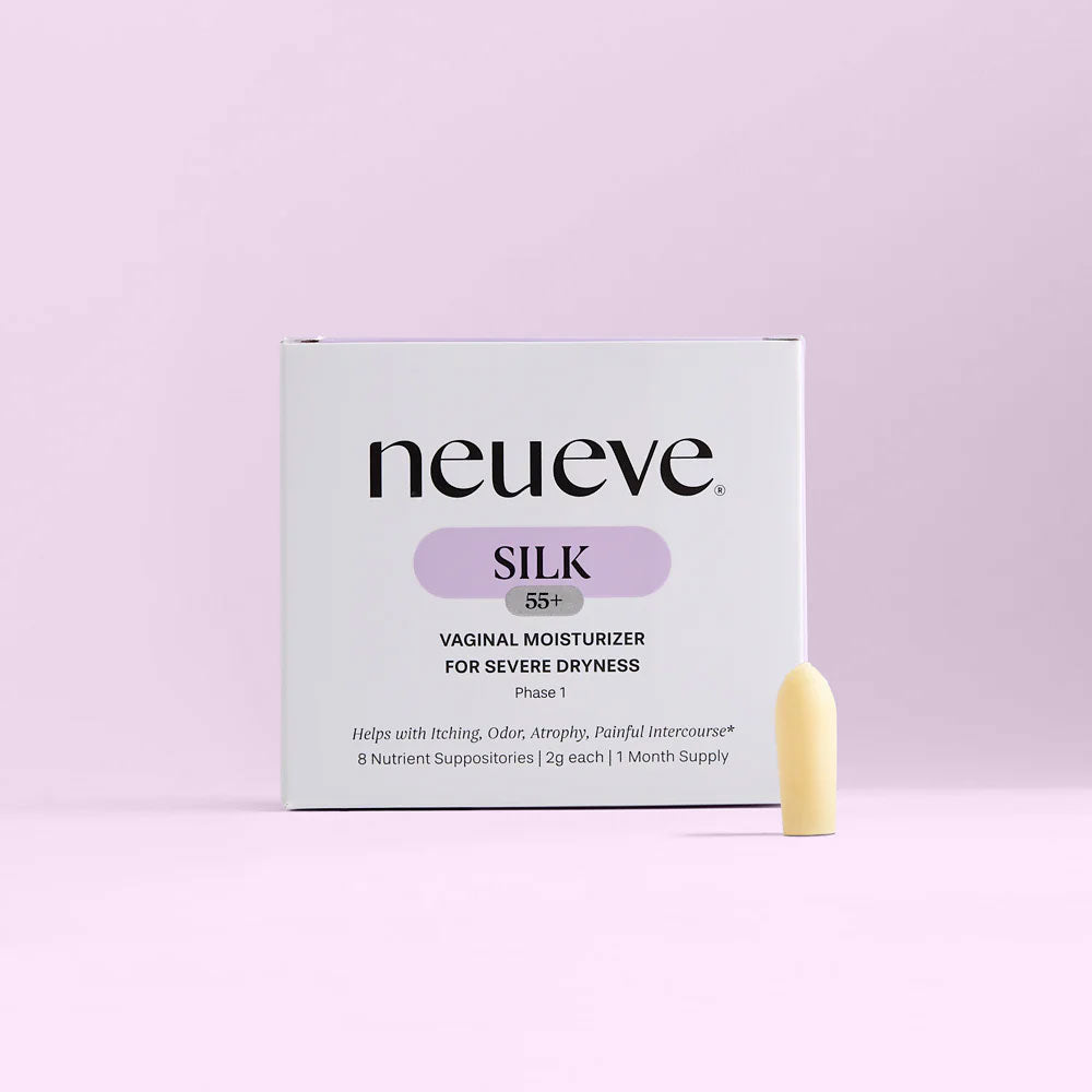 A box of NeuEve Silk 55+ Suppository is displayed against a light purple background, emphasizing vaginal health support, with one suppository standing upright in front of the packaging.