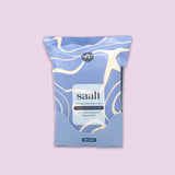 Saalt Intimate Cleansing Wipes, fragrance-free with 30 biodegradable wipes, are shown in a blue and cream abstract package against a light purple background.