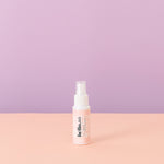 Hello Go spray for cleaning menstrual cups on purple pink background